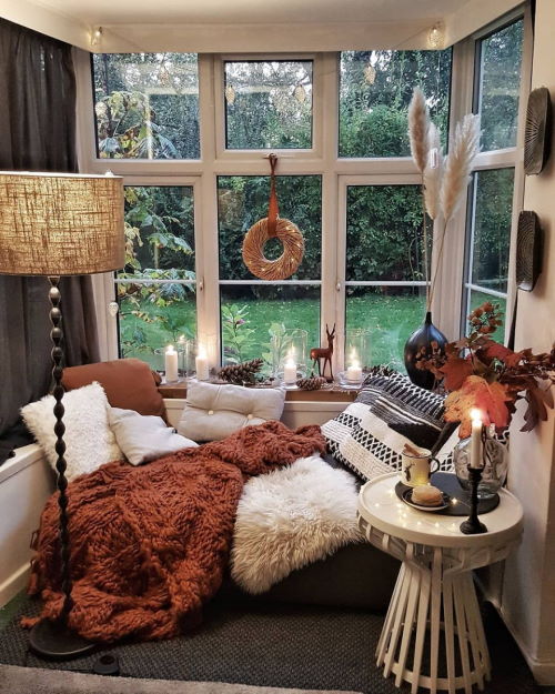 Interior or windows keeping room warm on autumn day