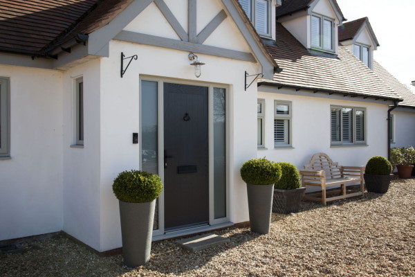 Cottage Style Home with light grey UPVC Window Frames